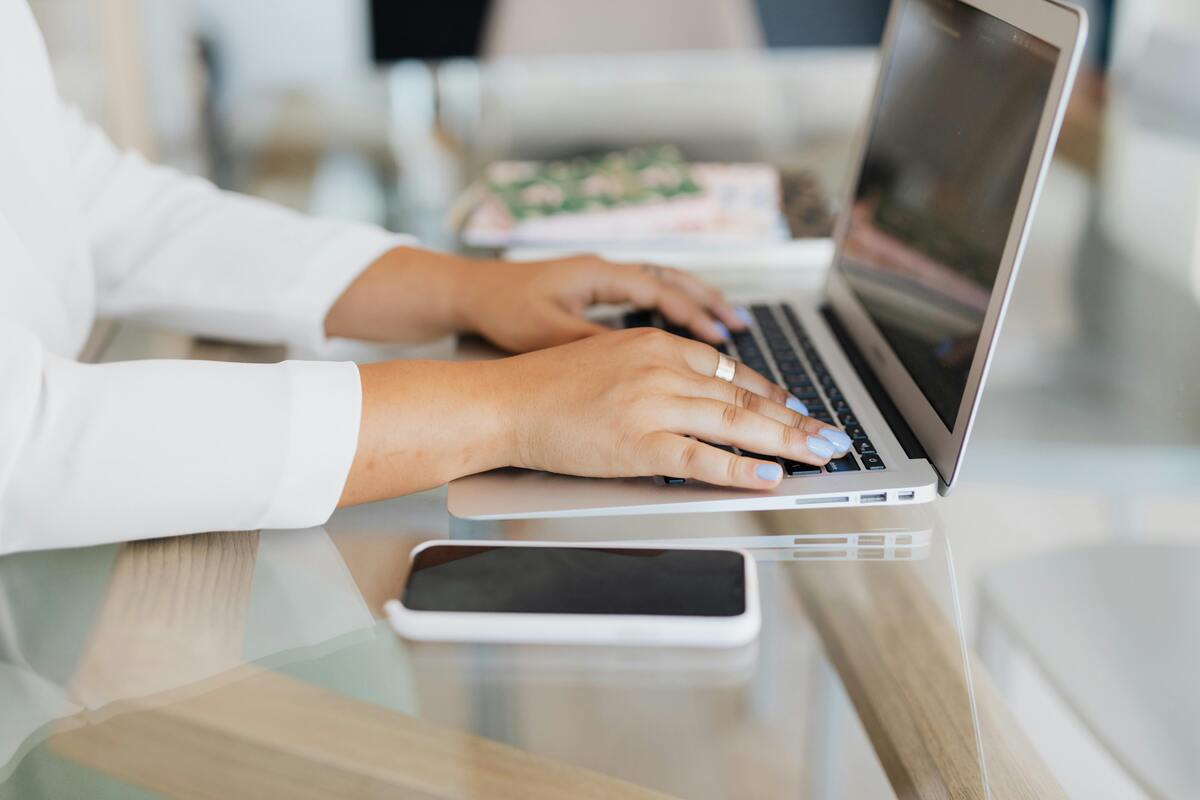 person working on a laptop computer
