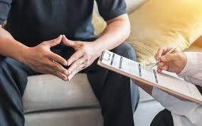 therapist screening another person for a mental health concern